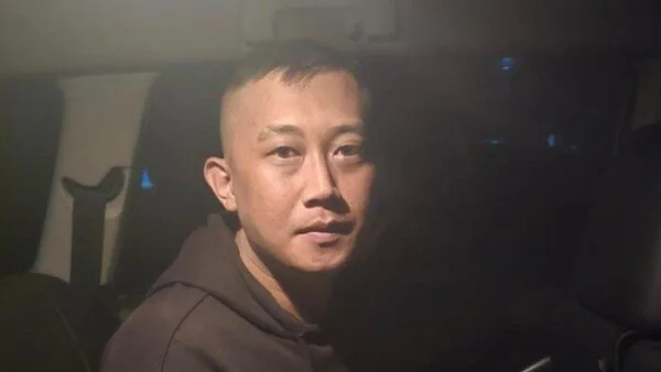 Tersangka penganiayaan dan penyekapan wanita di Jawa Barat, Taufik Hidayat, saat ditangkap polisi.