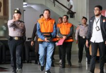 OTT KPK di Pemkab Kuansing, Bupati dan Sekda Jadi Tersangka Suap Jabatan Berkedok Mobil Mewah Foto Juru Bicara KPK Budi Prasetyo saat menggelar rilis resmi penahanan tersangka suap jabatan Pemkab Kuansing di Gedung Merah Putih KPK.